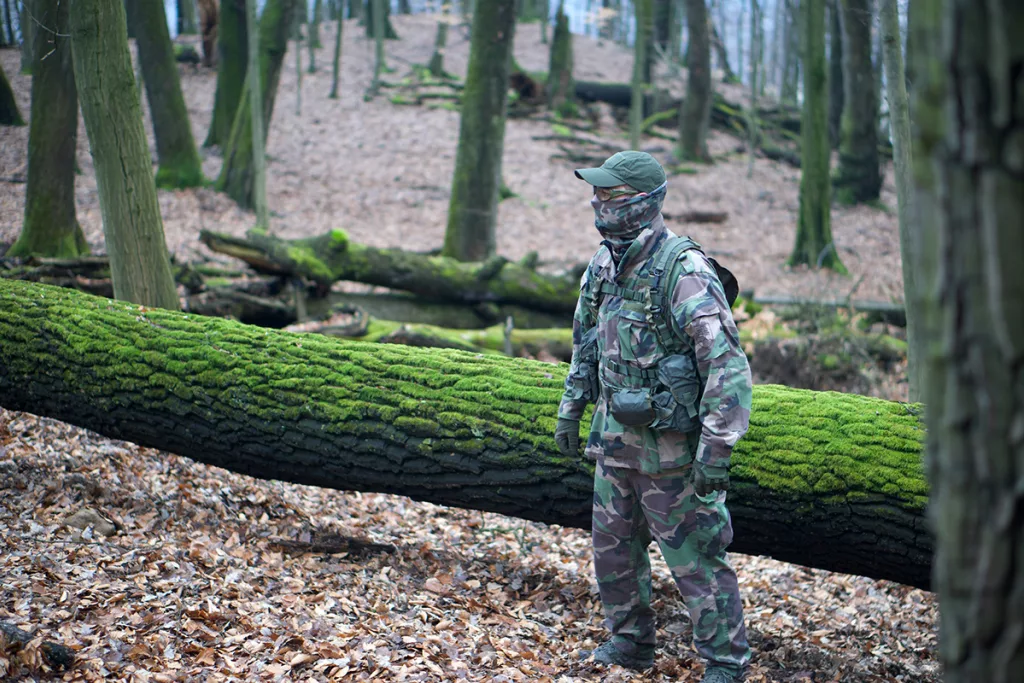 Long sleeves, pants, and sturdy shoes are essential for airsoft, but you don't need full camouflage and tactical gear. A sweatshirt, jeans, and hiking boots will work great.